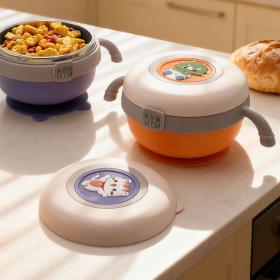 علبة طعام للأطفال بتصميم مرح وغطاء محكم للحفاظ على الوجبات طازجة.