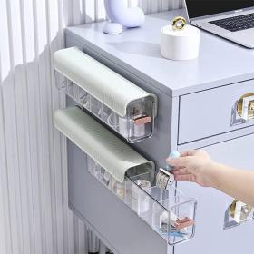 علبة تخزين متعددة الاستعمالات مع عدة خانات لتنظيم الأغراض بسهولة وفعالية.