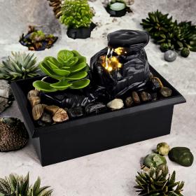 نافورة مياه ديكور بشلال مع إضاءة LED تضيف هدوءًا ولمسة فاخرة للديكور الداخلي.