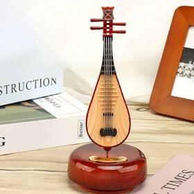 ديكور صندوق موسيقى على شكل آلة موسيقية صغيرة على شكل عود